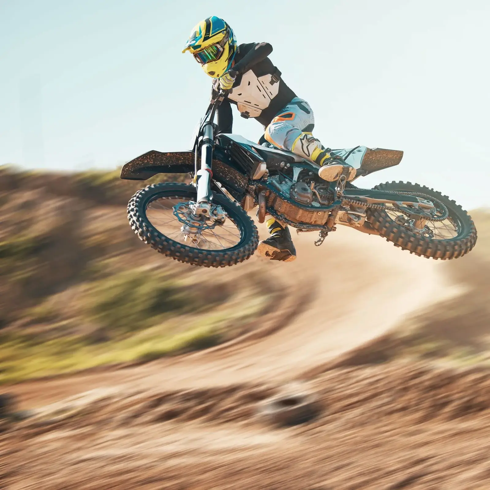 Driver, cycling and air jump on dirt track